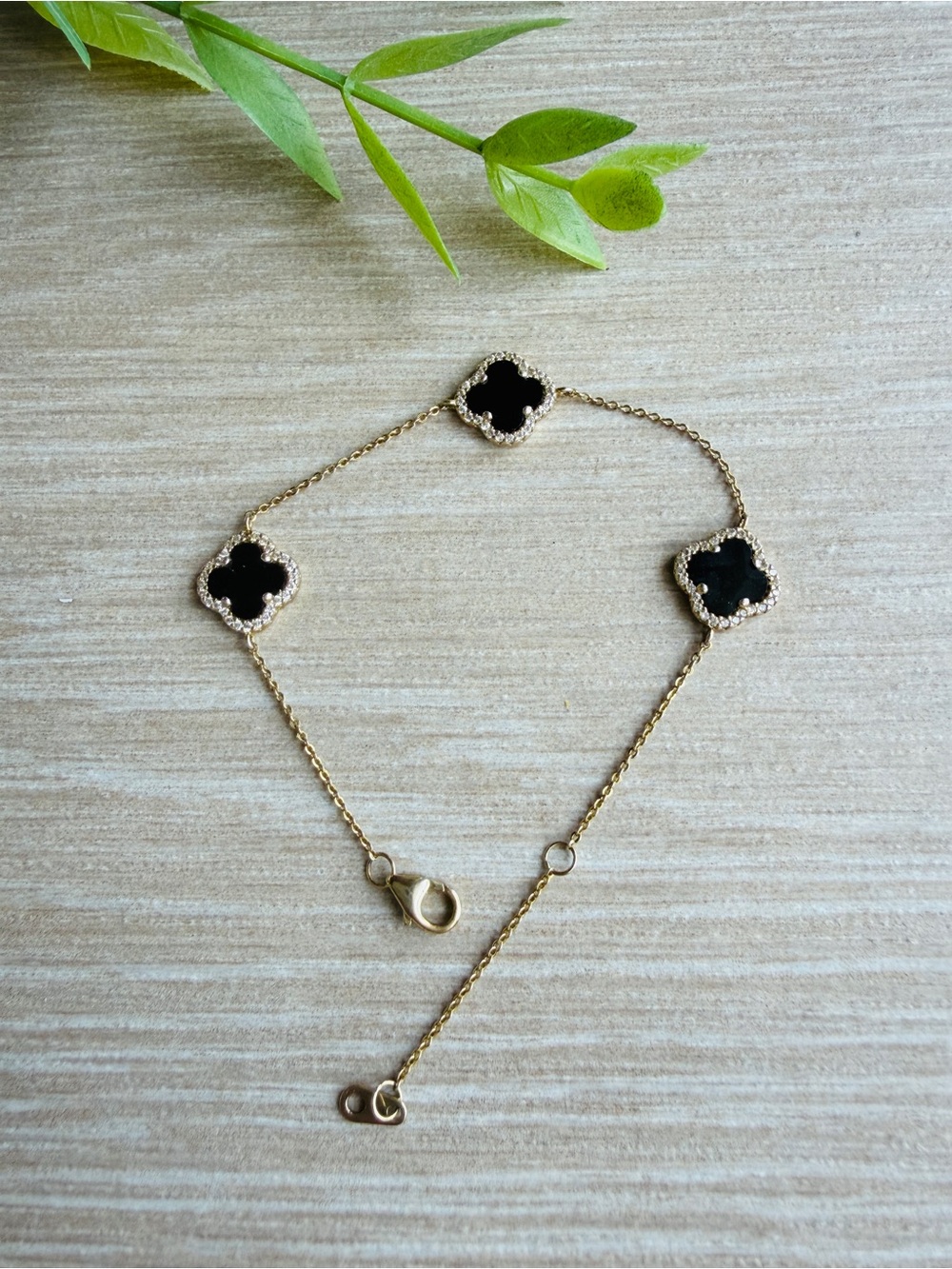 Gold Chain Bracelet with Black Clover Motifs